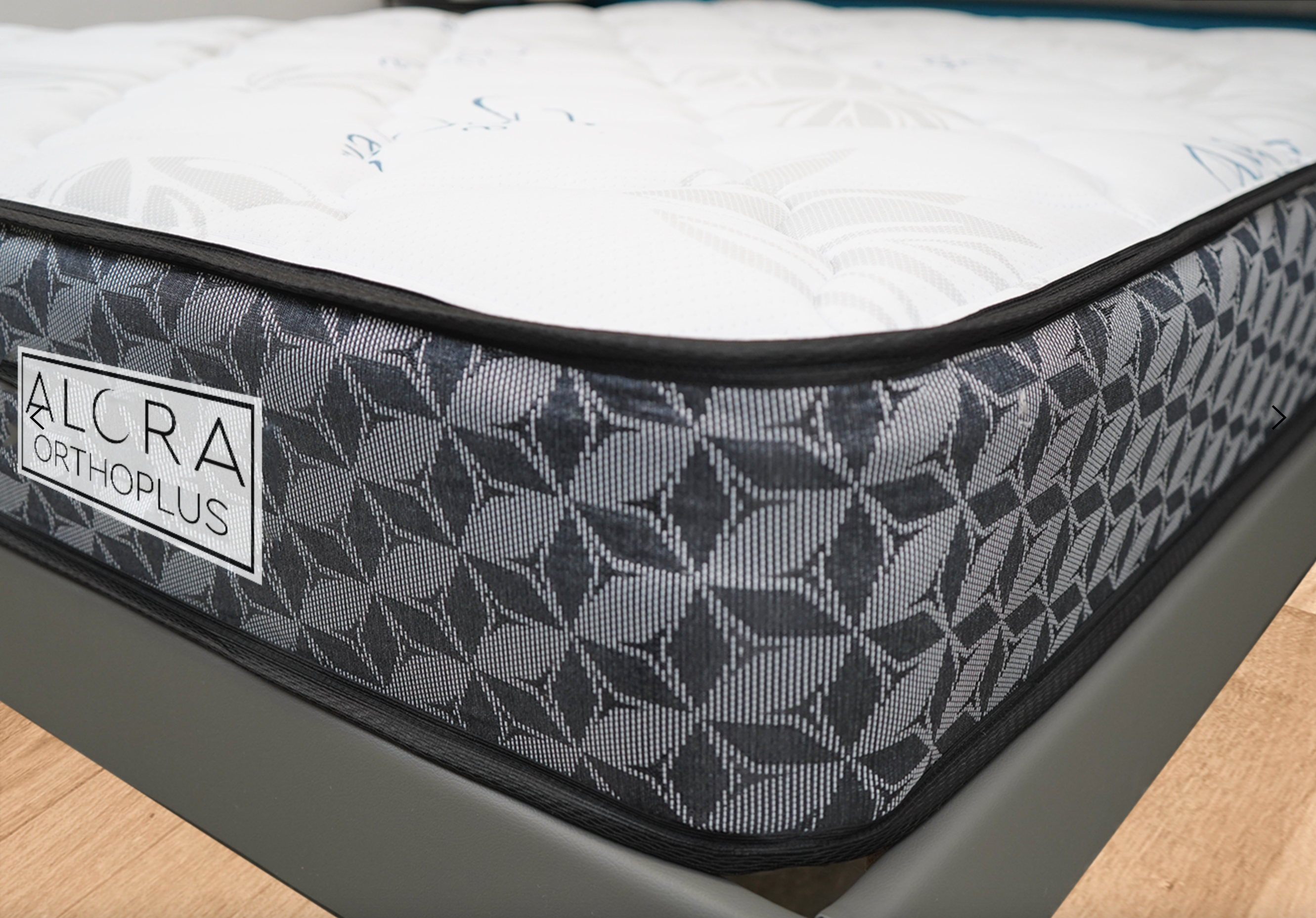 Side angle showing 10 inch thickness of orthopedic spring mattress