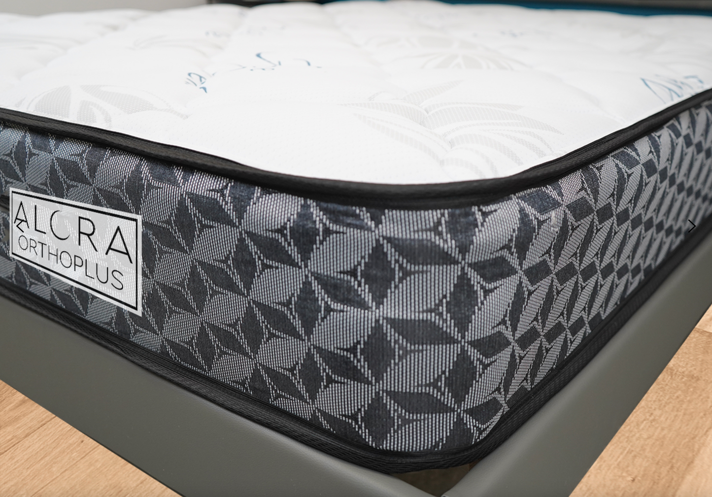 Side angle showing 10 inch thickness of orthopedic spring mattress