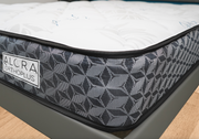 Side angle showing 10 inch thickness of orthopedic spring mattress