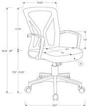 Black mesh office chair positioned under desk in compact home office