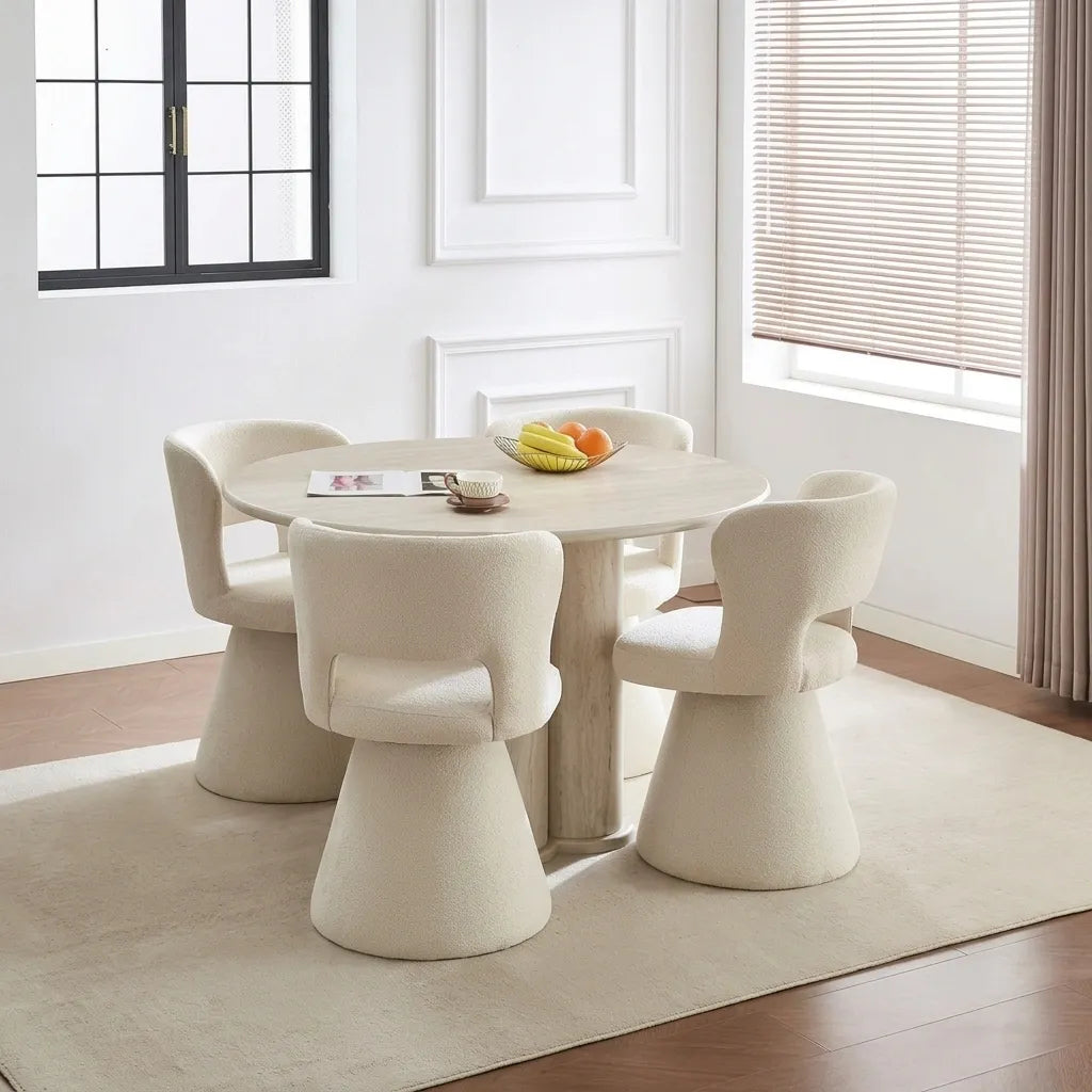 dining table and four cream textured swivel chairs