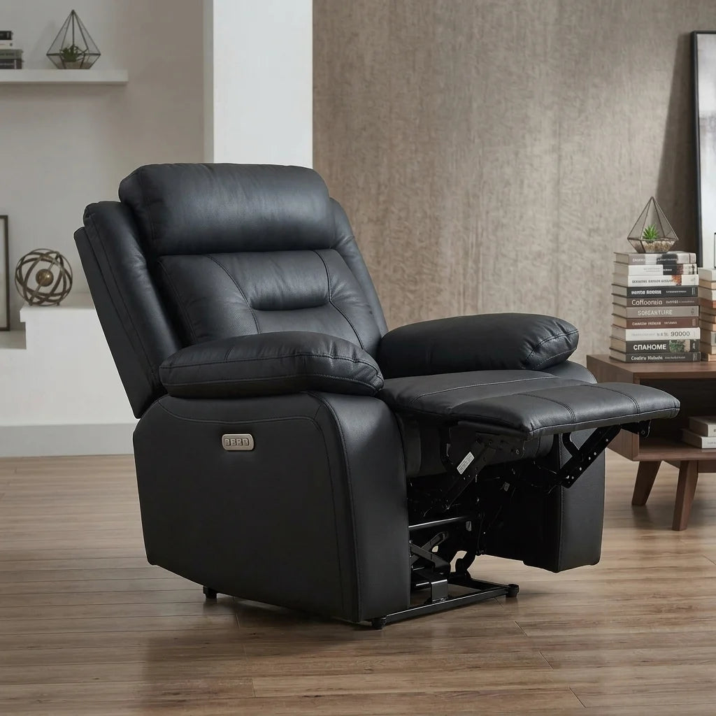 Three-quarter side angle view of a black leather recliner chair with extended footrest on wooden flooring