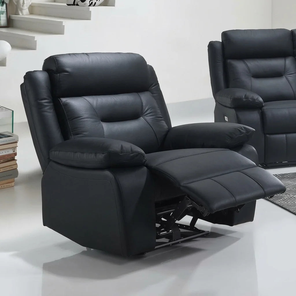 Square aspect ratio image of a black leather power recliner with extended footrest in a modern room setup