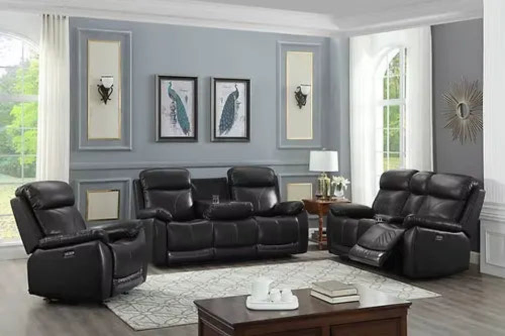 Black leather reclining sofa in fully reclined position