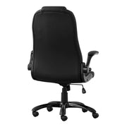 Padded headrest on black faux leather office chair