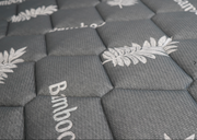 Flip design mattress with soft pillow top and medium firm support