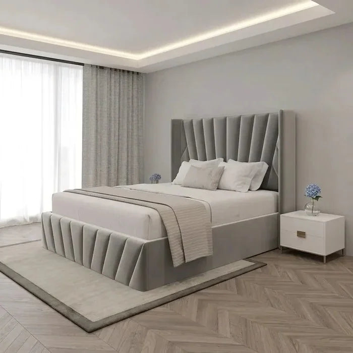 Bay Upholstered Storage Bed Frame featuring grey vertical channel tufting on the headboard and footboard.