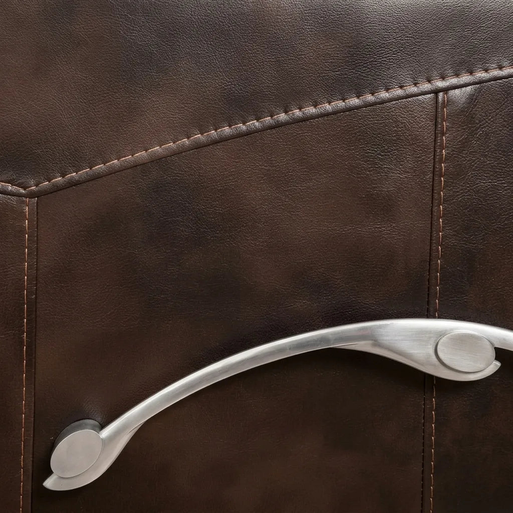 Detailed close-up view of the side leather panel of a brown recliner chair, showcasing heavy contrast stitching and a sleek brushed silver metal recliner release handle.