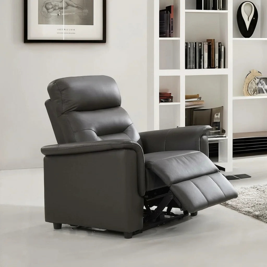 A detailed close-up shot of the black side control panel on a gray fabric power recliner, showing two lightning bolt icons and a small power button.