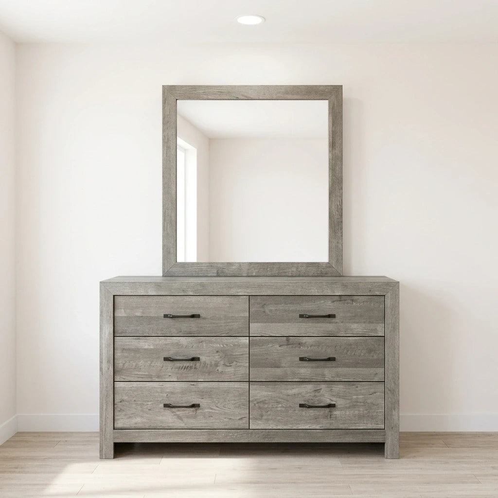 Rustic grey wood 6-drawer double dresser with black metal handles and matching framed wall mirror.