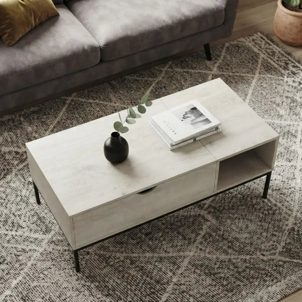 White laminate coffee table featuring a durable silver metal tube base and two-tier design, perfect for displaying books, plants, and decorative accessories.